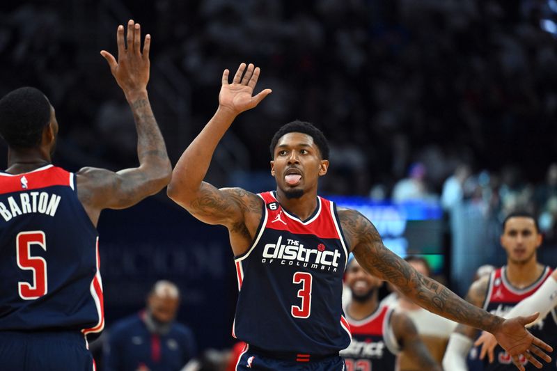 CLEVELAND, OHIO - OCTOBER 23: Will Barton #5 and Bradley Beal #3 of the Washington Wizards celebrate during the fourth quarter against the Cleveland Cavaliers at Rocket Mortgage Fieldhouse on October 23, 2022 in Cleveland, Ohio. The Cavaliers defeated the Wizards 117-107 in overtime. NOTE TO USER: User expressly acknowledges and agrees that, by downloading and or using this photograph, User is consenting to the terms and conditions of the Getty Images License Agreement. (Photo by Jason Miller/Getty Images)