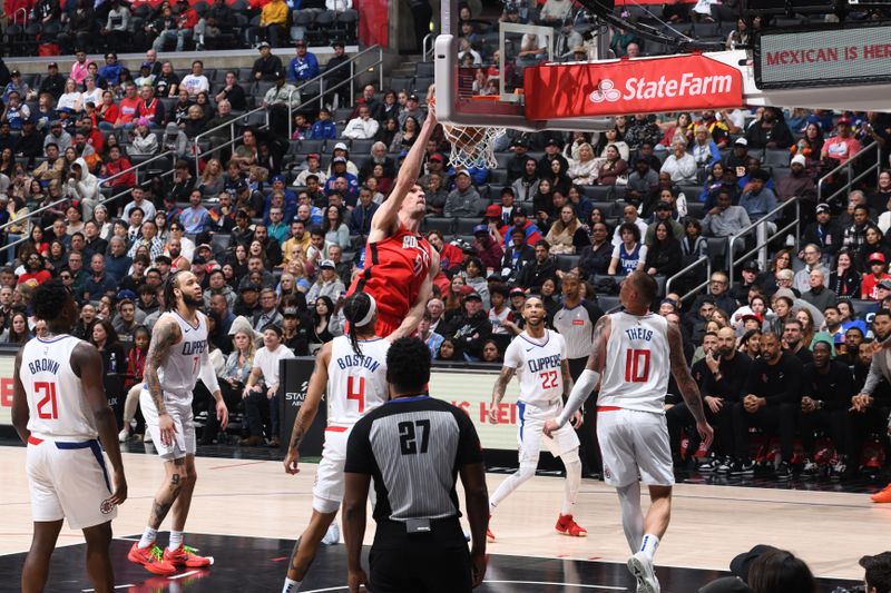 LOS ANGELES, CA - APIRL 14: Boban Marjanovic #51 of the Houston Rockets dunks the ball during the game against the LA Clippers on April 14, 2024 at Crypto.Com Arena in Los Angeles, California. NOTE TO USER: User expressly acknowledges and agrees that, by downloading and/or using this Photograph, user is consenting to the terms and conditions of the Getty Images License Agreement. Mandatory Copyright Notice: Copyright 2024 NBAE (Photo by Adam Pantozzi/NBAE via Getty Images)