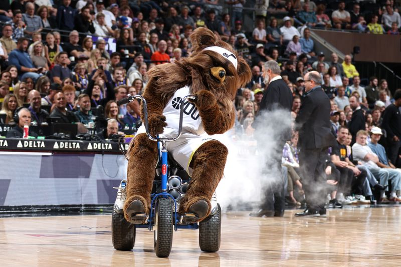 SALT LAKE CITY, UT - OCTOBER 15: Mascot Jazz Bear of the Utah Jazz rides a bike during the game against the Sacramento Kings on October 15, 2024 at Delta Center in Salt Lake City, Utah. NOTE TO USER: User expressly acknowledges and agrees that, by downloading and or using this Photograph, User is consenting to the terms and conditions of the Getty Images License Agreement. Mandatory Copyright Notice: Copyright 2024 NBAE (Photo by Melissa Majchrzak/NBAE via Getty Images)