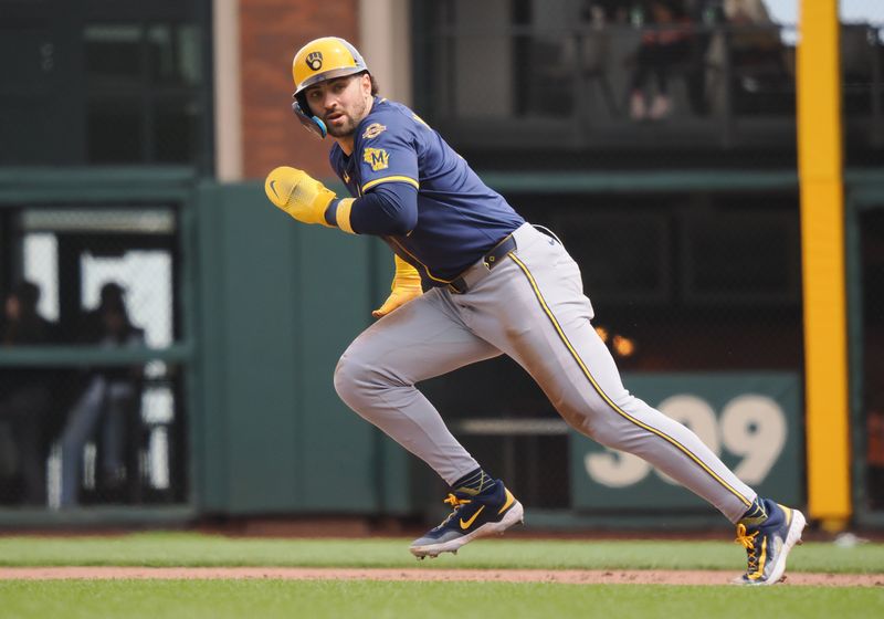 Apr 24, 2025; San Francisco, California, USA; Milwaukee Brewers center fielder Garrett Mitchell (5) runs to steal second base against the San Francisco Giants during the eighth inning at Oracle Park. Mandatory Credit: Kelley L Cox-Imagn Images