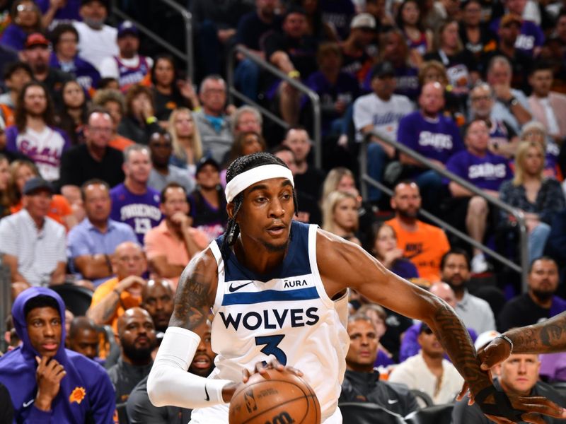 PHOENIX, AZ - APRIL 4: Jaden McDaniels #3 of the Minnesota Timberwolves drives to the basket during the game against the Phoenix Suns during Round 1 Game 4 of the 2024 NBA Playoffs on April 4, 2023 at Footprint Center in Phoenix, Arizona. NOTE TO USER: User expressly acknowledges and agrees that, by downloading and or using this photograph, user is consenting to the terms and conditions of the Getty Images License Agreement. Mandatory Copyright Notice: Copyright 2024 NBAE (Photo by Barry Gossage/NBAE via Getty Images)