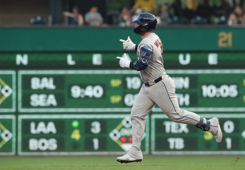 Jun 3, 2025; Pittsburgh, Pennsylvania, USA;  Houston Astros first baseman Christian Walker (8) gestures to the Astros bullpen as he circles the bases on a solo home run against the Pittsburgh Pirates during the seventh inning at PNC Park. Mandatory Credit: Charles LeClaire-Imagn Images