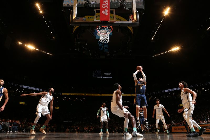 BROOKLYN, NY - MARCH 19: Jonas Valanciunas #17 of the New Orleans Pelicans shoots the ball during the game against the Brooklyn Nets  on March 19, 2024 at Barclays Center in Brooklyn, New York. NOTE TO USER: User expressly acknowledges and agrees that, by downloading and or using this Photograph, user is consenting to the terms and conditions of the Getty Images License Agreement. Mandatory Copyright Notice: Copyright 2024 NBAE (Photo by Nathaniel S. Butler/NBAE via Getty Images)