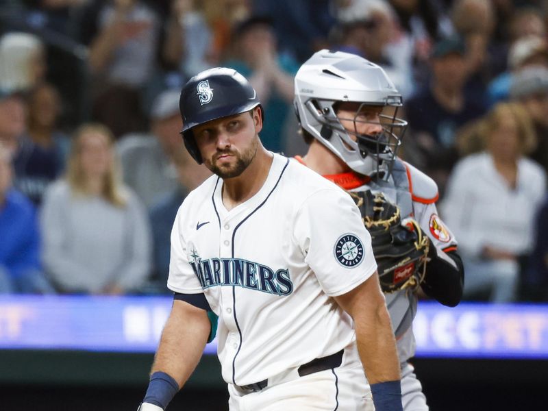 Jul 2, 2024; Seattle, Washington, USA; Seattle Mariners catcher Cal Raleigh (29) reacts after striking out against the Baltimore Orioles during the ninth inning at T-Mobile Park. Mandatory Credit: Joe Nicholson-USA TODAY Sports