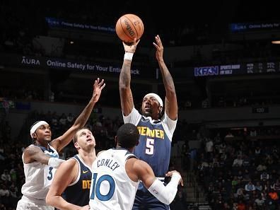 MINNEAPOLIS, MN -  NOVEMBER 1: Kentavious Caldwell-Pope #5 of the Denver Nuggets shoots the ball during the game against the Minnesota Timberwolves on November 1, 2023 at Target Center in Minneapolis, Minnesota. NOTE TO USER: User expressly acknowledges and agrees that, by downloading and or using this Photograph, user is consenting to the terms and conditions of the Getty Images License Agreement. Mandatory Copyright Notice: Copyright 2023 NBAE (Photo by David Sherman/NBAE via Getty Images)