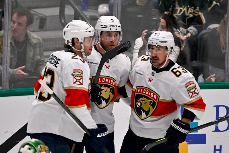 Dec 13, 2025; Dallas, Texas, USA; Florida Panthers center Carter Verhaeghe (23) and center Sam Bennett (9) and left wing Brad Marchand (63) celebrates a goal scored by Bennett against the Dallas Stars during the second period at the American Airlines Center. Mandatory Credit: Jerome Miron-Imagn Images