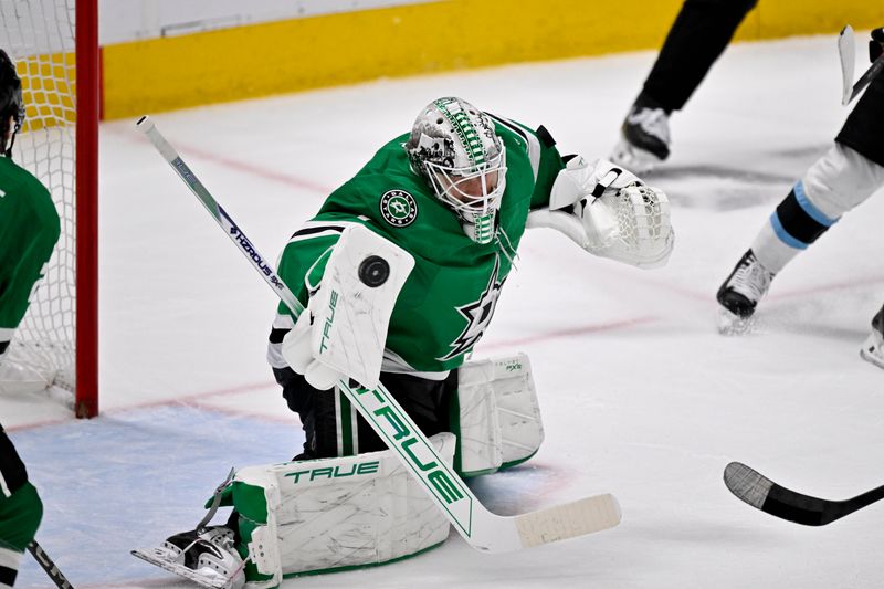 Apr 12, 2025; Dallas, Texas, USA; Dallas Stars goaltender Casey DeSmith (1) stops a shot by the Utah Hockey Club during the second period at the American Airlines Center. Mandatory Credit: Jerome Miron-Imagn Images