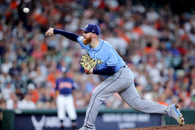 Jul 30, 2023; Houston, Texas, USA; Tampa Bay Rays starting pitcher Zack Littell (52) pitches against the Houston Astros during the first inning at Minute Maid Park. Mandatory Credit: Erik Williams-USA TODAY Sports