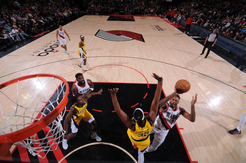 PORTLAND, OR - JANUARY 19: Jabari Walker #34 of the Portland Trail Blazers drives to the basket during the game against the Indiana Pacers on January 19, 2024 at the Moda Center Arena in Portland, Oregon. NOTE TO USER: User expressly acknowledges and agrees that, by downloading and or using this photograph, user is consenting to the terms and conditions of the Getty Images License Agreement. Mandatory Copyright Notice: Copyright 2024 NBAE (Photo by Cameron Browne/NBAE via Getty Images)