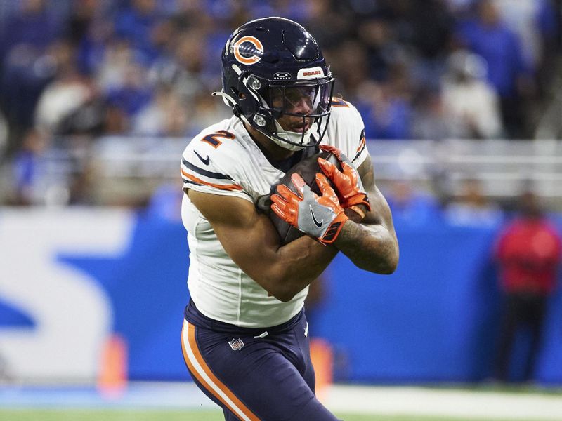 Chicago Bears wide receiver DJ Moore (2) runs the ball against the Detroit Lions during an NFL football game at Ford Field in Detroit, Sunday, Nov. 19, 2023. (AP Photo/Rick Osentoski)