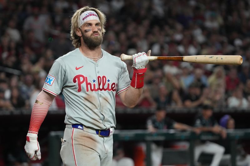 Aug 9, 2024; Phoenix, Arizona, USA; Philadelphia Phillies first base Bryce Harper (3) reacts after a high pitch in the ninth inning during a game against the Arizona Diamondbacks at Chase Field. Mandatory Credit: Rick Scuteri-USA TODAY Sports