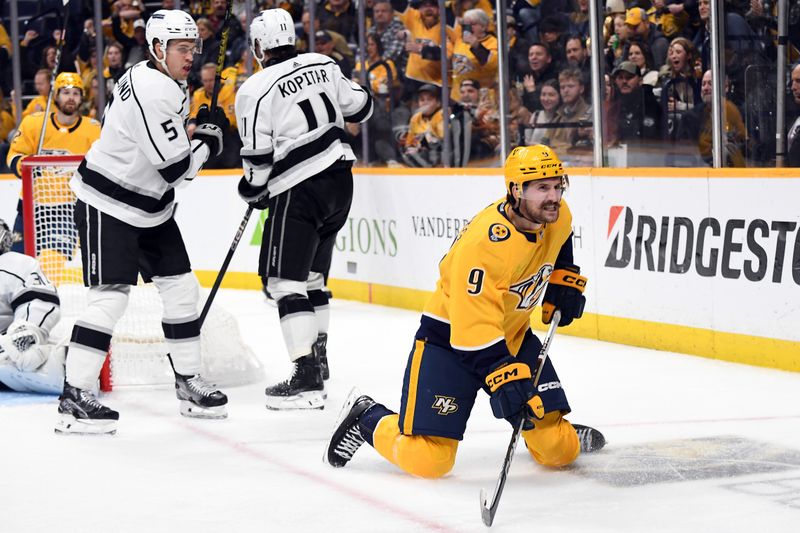 Jan 31, 2024; Nashville, Tennessee, USA; Nashville Predators left wing Filip Forsberg (9) celebrates after a goal during the third period against the Los Angeles Kings at Bridgestone Arena. Mandatory Credit: Christopher Hanewinckel-USA TODAY Sports