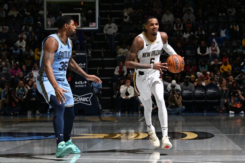 MEMPHIS, TN - NOVEMBER 29: Dejounte Murray #5 of the New Orleans Pelicans handles the ball during the game against the Memphis Grizzlies during the Emirates NBA Cup game on November 29, 2024 at FedExForum in Memphis, Tennessee. NOTE TO USER: User expressly acknowledges and agrees that, by downloading and or using this photograph, User is consenting to the terms and conditions of the Getty Images License Agreement. Mandatory Copyright Notice: Copyright 2024 NBAE (Photo by Grant Burke/NBAE via Getty Images)