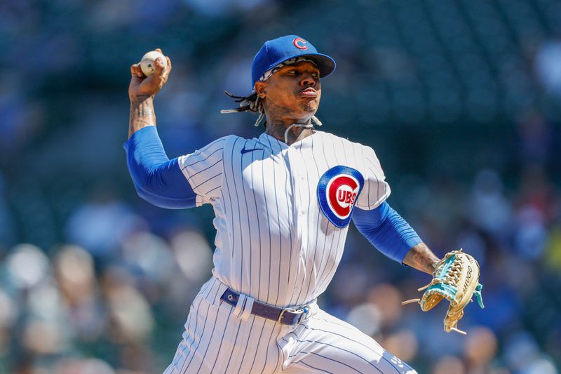 Apr 12, 2023; Chicago, Illinois, USA; Chicago Cubs starting pitcher Marcus Stroman (0) delivers against the Seattle Mariners during the first inning at Wrigley Field. Mandatory Credit: Kamil Krzaczynski-USA TODAY Sports