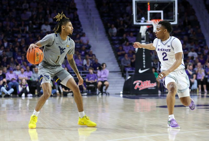 Feb 26, 2024; Manhattan, Kansas, USA; West Virginia Mountaineers guard Noah Farrakhan (1) dribbles the ball during the second half against the Kansas State Wildcats at Bramlage Coliseum. Mandatory Credit: Scott Sewell-USA TODAY Sports