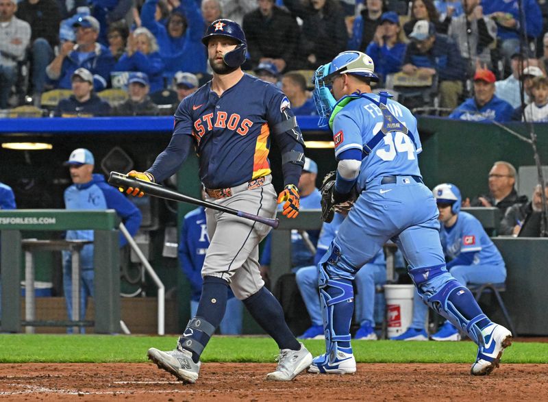 Apr 26, 2025; Kansas City, Missouri, USA;  Houston Astros first baseman Christian Walker (8) reacts after striking out to end the eighth inning against the Kansas City Royals at Kauffman Stadium. Mandatory Credit: Peter Aiken-Imagn Images
