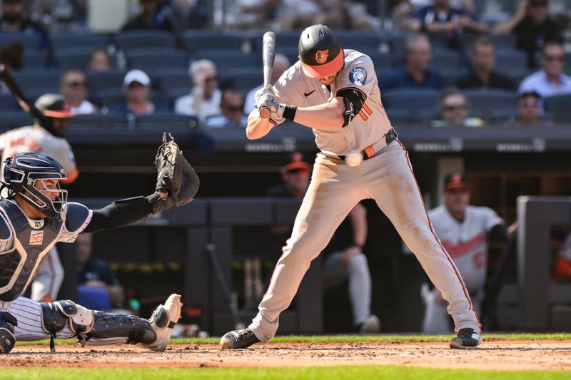 Jun 20, 2024; Bronx, New York, USA; Baltimore Orioles third baseman Jordan Westburg (11) takes a ball inside during the second inning against the New York Yankees at Yankee Stadium. Mandatory Credit: John Jones-USA TODAY Sports