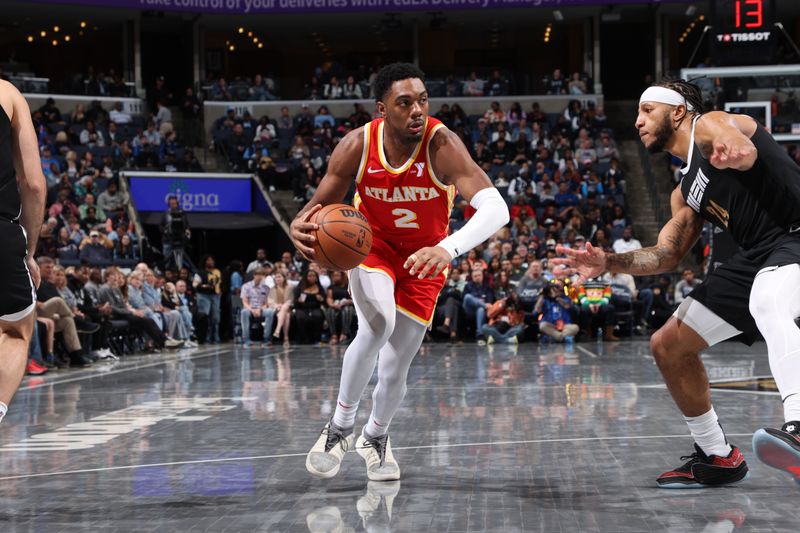 MEMPHIS, TN - MARCH 8: Trent Forrest #2 of the Atlanta Hawks dribbles the ball during the game against the Memphis Grizzlies on March 8, 2024 at FedExForum in Memphis, Tennessee. NOTE TO USER: User expressly acknowledges and agrees that, by downloading and or using this photograph, User is consenting to the terms and conditions of the Getty Images License Agreement. Mandatory Copyright Notice: Copyright 2024 NBAE (Photo by Joe Murphy/NBAE via Getty Images)