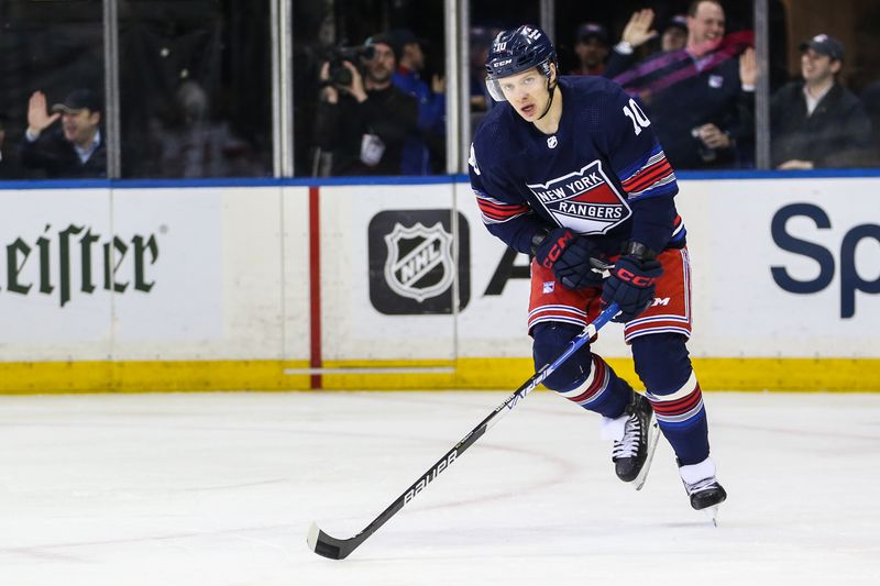 Apr 3, 2024; New York, New York, USA; New York Rangers left wing Artemi Panarin (10) skates back to there bench after scoring a goal in the first period against the New Jersey Devils at Madison Square Garden. Mandatory Credit: Wendell Cruz-USA TODAY Sports