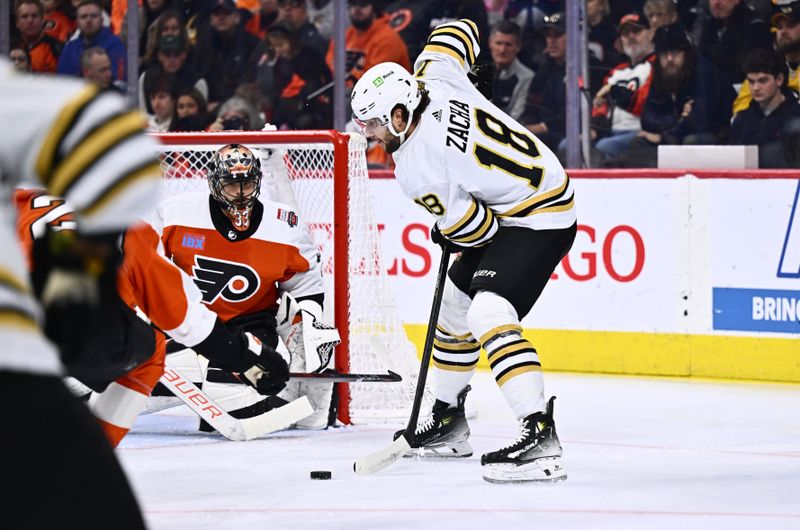 Jan 27, 2024; Philadelphia, Pennsylvania, USA; Boston Bruins center Pavel Zacha (18) reaches for the puck against the Philadelphia Flyers in the first period at Wells Fargo Center. Mandatory Credit: Kyle Ross-USA TODAY Sports