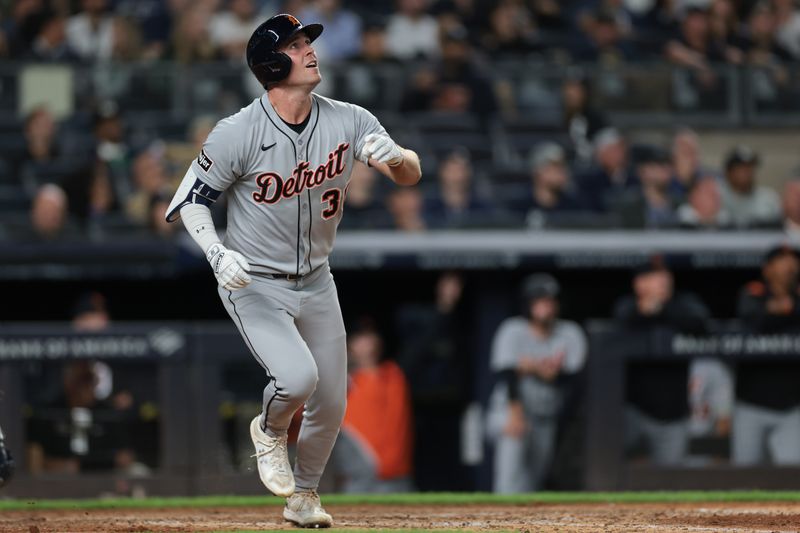 Sep 10, 2025; Bronx, New York, USA; Detroit Tigers right fielder Kerry Carpenter (30) hits a two run home run during the eighth inning against the New York Yankees at Yankee Stadium. Mandatory Credit: Vincent Carchietta-Imagn Images