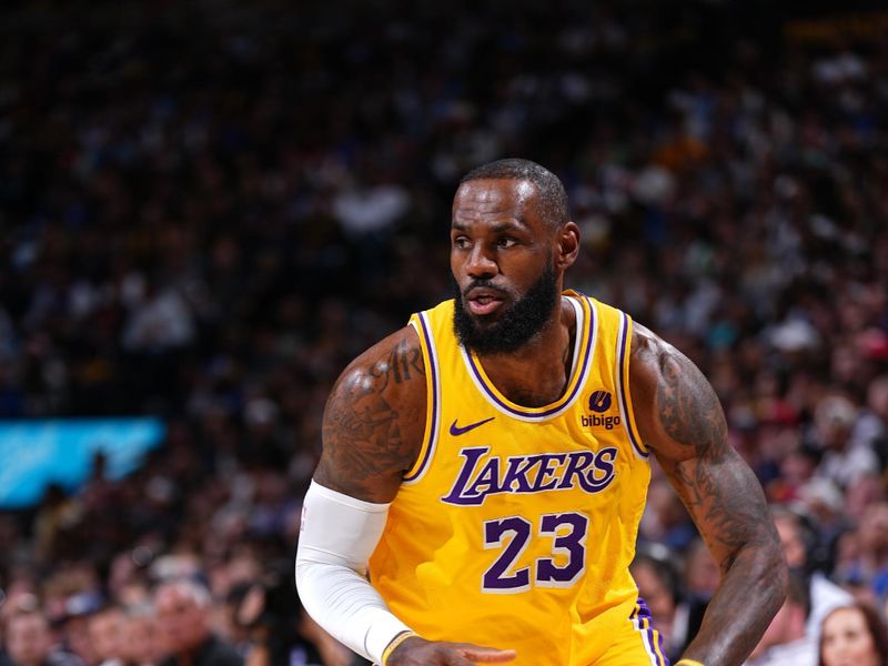 DENVER, CO - APRRIL 22: LeBron James #23 of the Los Angeles Lakers drives to the basket during the game against the Denver Nuggets during Round 1 Game 2 of the 2024 NBA Playoffs on April 22, 2024 at the Ball Arena in Denver, Colorado. NOTE TO USER: User expressly acknowledges and agrees that, by downloading and/or using this Photograph, user is consenting to the terms and conditions of the Getty Images License Agreement. Mandatory Copyright Notice: Copyright 2024 NBAE (Photo by Garrett Ellwood/NBAE via Getty Images)