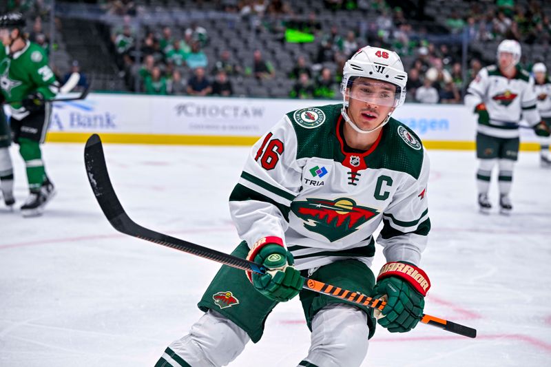 Sep 29, 2022; Dallas, Texas, USA; Minnesota Wild defenseman Jared Spurgeon (46) reacts to scoring a goal against the Dallas Stars during the third period at the American Airlines Center. Mandatory Credit: Jerome Miron-USA TODAY Sports