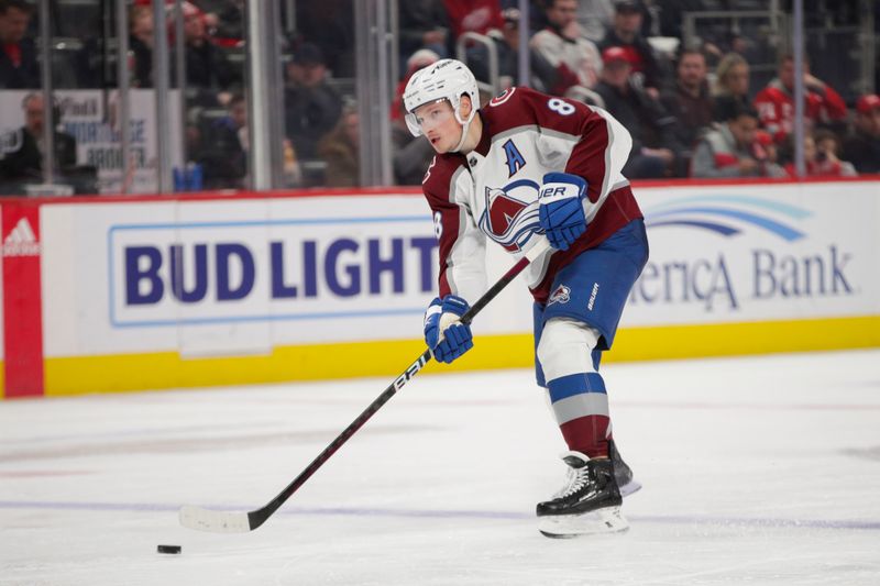 Mar 18, 2023; Detroit, Michigan, USA; Colorado Avalanche defenseman Cale Makar (8) handles the puck against the Detroit Red Wings during the third period at Little Caesars Arena. Mandatory Credit: Brian Bradshaw Sevald-USA TODAY Sports