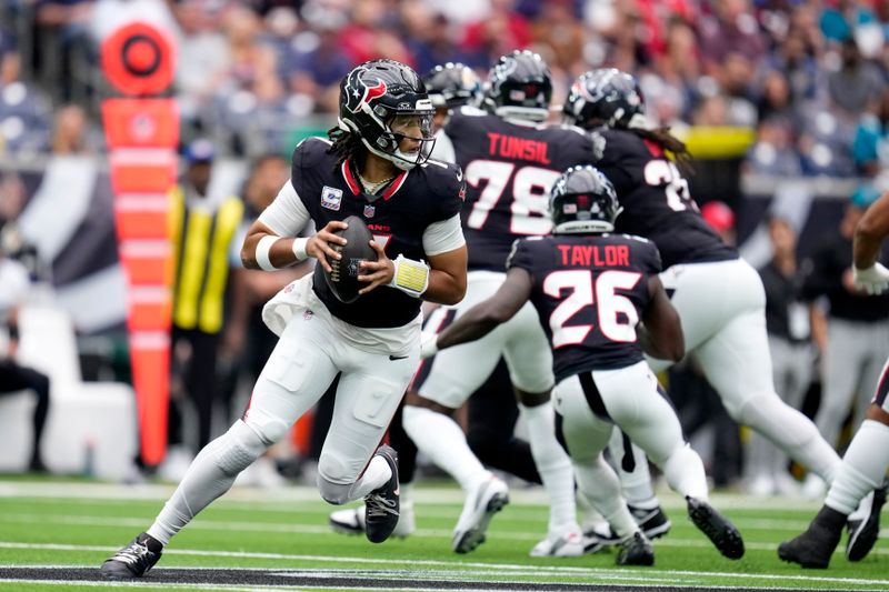 Houston Texans quarterback C.J. Stroud (7) looks to pass during the first half of an NFL football game against the Jacksonville Jaguars, Sunday, Sept. 29, 2024, in Houston. (AP Photo/Eric Christian Smith)