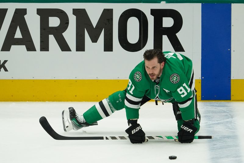 Apr 19, 2025; Dallas, Texas, USA; Dallas Stars center Tyler Seguin (91) stretches during warm-ups prior to game one of the first round of the 2025 Stanley Cup Playoffs against the Colorado Avalanche at American Airlines Center. Mandatory Credit: Raymond Carlin III-Imagn Images