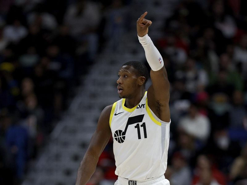 NEW ORLEANS, LOUISIANA - JANUARY 23: Kris Dunn #11 of the Utah Jazz dribbles the ball down court during the second quarter of an NBA game against the New Orleans Pelicans at Smoothie King Center on January 23, 2024 in New Orleans, Louisiana. NOTE TO USER: User expressly acknowledges and agrees that, by downloading and or using this photograph, User is consenting to the terms and conditions of the Getty Images License Agreement. (Photo by Sean Gardner/Getty Images)