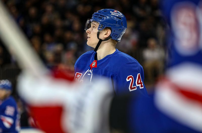 Mar 19, 2024; New York, New York, USA; New York Rangers right wing Kaapo Kakko (24) looks at the video board during a break against the Winnipeg Jets during the first period at Madison Square Garden. Mandatory Credit: Danny Wild-USA TODAY Sports