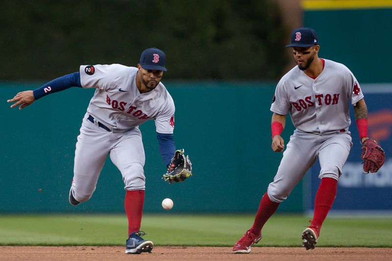 Apr 11, 2022; Detroit, Michigan, USA; Boston Red Sox shortstop Xander Bogaerts (2) fields a ground ball hit by Detroit Tigers right fielder Robbie Grossman (not pictured) during the first inning at Comerica Park. Mandatory Credit: Raj Mehta-USA TODAY Sports