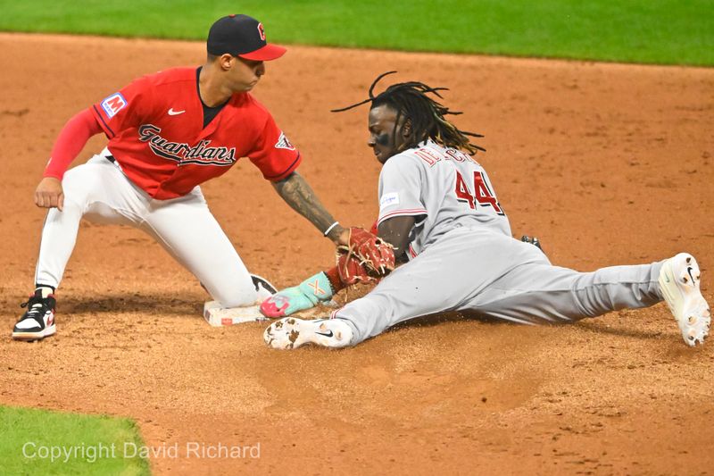 Sep 27, 2023; Cleveland, Ohio, USA; Cincinnati Reds shortstop Elly De La Cruz (44) steals second base beside Cleveland Guardians shortstop Brayan Rocchio (6) in the fifth inning at Progressive Field. Mandatory Credit: David Richard-USA TODAY Sports