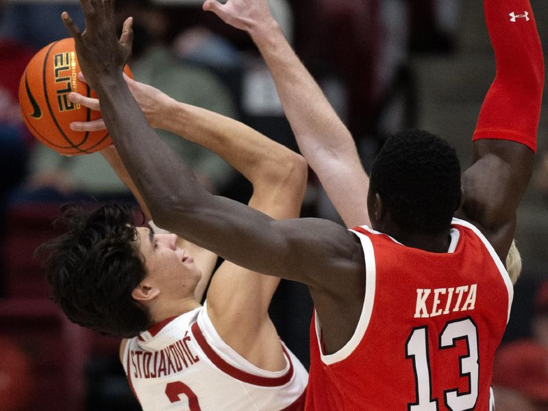 Jan 14, 2024; Stanford, California, USA; Stanford Cardinal guard Andrej Stojakovic (2) attempts to shoot over Utah Utes center Keba Keita (13) during the first half at Maples Pavilion. Mandatory Credit: D. Ross Cameron-USA TODAY Sports