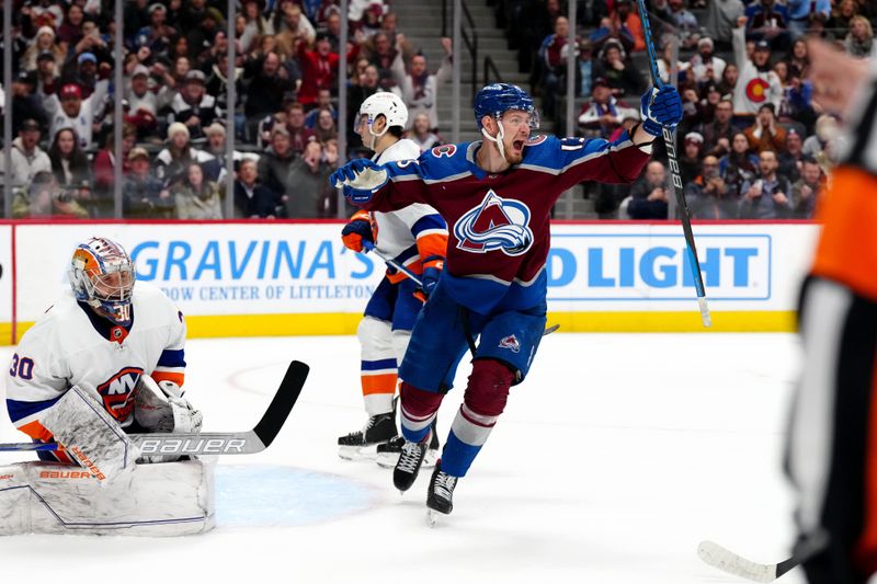 Jan 2, 2024; Denver, Colorado, USA; Colorado Avalanche right wing Valeri Nichushkin (13) celebrates an overtime goal on New York Islanders goaltender Ilya Sorokin (30) at Ball Arena. Mandatory Credit: Ron Chenoy-USA TODAY Sports