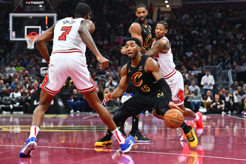 CLEVELAND, OHIO - NOVEMBER 15: Jalen Smith #7 of the Chicago Bulls guards Donovan Mitchell #45 of the Cleveland Cavaliers during the second quarter of the Emirates NBA Cup at Rocket Mortgage Fieldhouse on November 15, 2024 in Cleveland, Ohio. NOTE TO USER: User expressly acknowledges and agrees that, by downloading and or using this photograph, User is consenting to the terms and conditions of the Getty Images License Agreement. (Photo by Jason Miller/Getty Images)