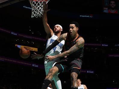 WASHINGTON, DC -? DECEMBER 26:  Kyle Kuzma #33 of the Washington Wizards passes the ball during the game  on December 26, 2023 at Capital One Arena in Washington, DC. NOTE TO USER: User expressly acknowledges and agrees that, by downloading and or using this Photograph, user is consenting to the terms and conditions of the Getty Images License Agreement. Mandatory Copyright Notice: Copyright 2023 NBAE (Photo by Stephen Gosling/NBAE via Getty Images)