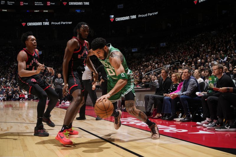 TORONTO, CANADA - JANUARY 15: Jayson Tatum #0 of the Boston Celtics handles the ball during the game against the Toronto Raptors on January 15, 2024 at the Scotiabank Arena in Toronto, Ontario, Canada.  NOTE TO USER: User expressly acknowledges and agrees that, by downloading and or using this Photograph, user is consenting to the terms and conditions of the Getty Images License Agreement.  Mandatory Copyright Notice: Copyright 2024 NBAE (Photo by Mark Blinch/NBAE via Getty Images)