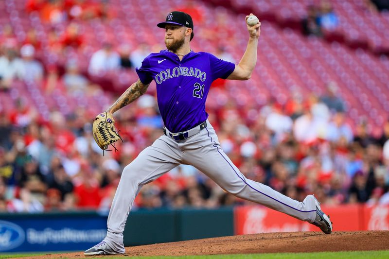 Jul 10, 2024; Cincinnati, Ohio, USA; Colorado Rockies starting pitcher Kyle Freeland (21) pitches against the Cincinnati Reds in the first inning at Great American Ball Park. Mandatory Credit: Katie Stratman-USA TODAY Sports
