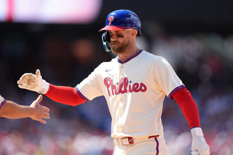 May 18, 2025; Philadelphia, Pennsylvania, USA; Philadelphia Phillies infielder Bryce Harper (3) reacts after hitting a single against the Pittsburgh Pirates in the sixth inning at Citizens Bank Park. Mandatory Credit: Kyle Ross-Imagn Images