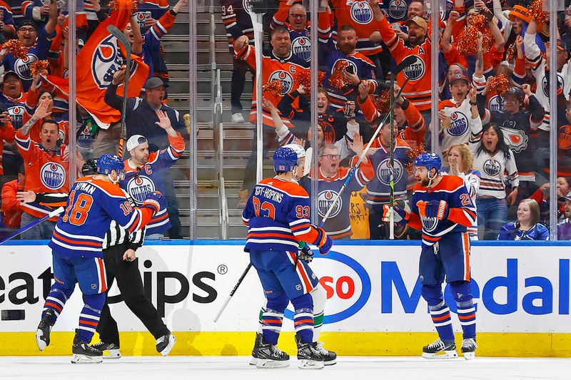 May 12, 2024; Edmonton, Alberta, CAN; The Edmonton Oilers celebrate a goal scored by defensemen Mattias Ekholm (14) during the second period against the Vancouver Canucks in game three of the second round of the 2024 Stanley Cup Playoffs at Rogers Place. Mandatory Credit: Perry Nelson-USA TODAY Sports