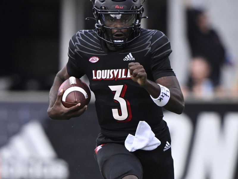 Oct 29, 2022; Louisville, Kentucky, USA;  Louisville Cardinals quarterback Malik Cunningham (3) runs the ball against the Wake Forest Demon Deacons during the first  half at Cardinal Stadium. Louisville defeated Wake Forest 48-21. Mandatory Credit: Jamie Rhodes-USA TODAY Sports