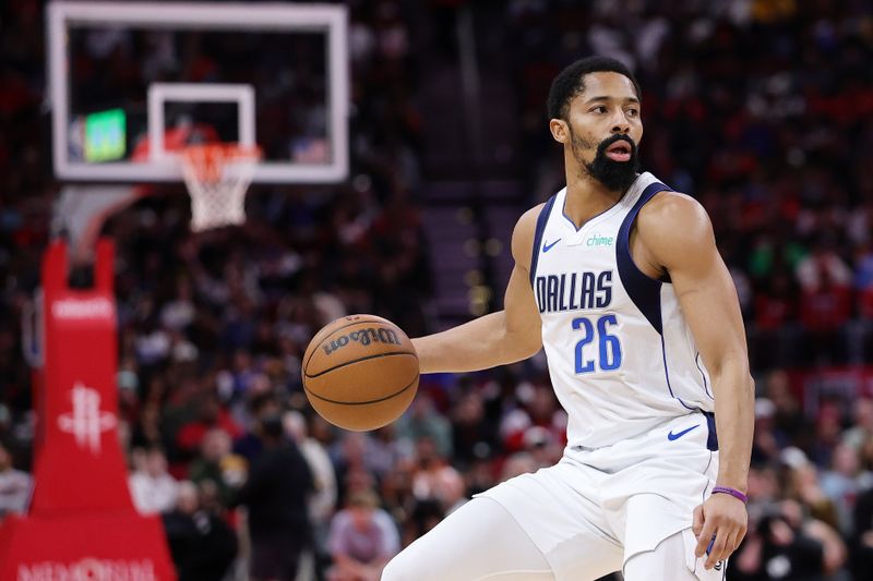 HOUSTON, TEXAS - JANUARY 01: Spencer Dinwiddie #26 of the Dallas Mavericks handles the ball against the Houston Rockets during the first half at Toyota Center on January 01, 2025 in Houston, Texas. NOTE TO USER: User expressly acknowledges and agrees that, by downloading and or using this photograph, User is consenting to the terms and conditions of the Getty Images License Agreement. (Photo by Alex Slitz/Getty Images)