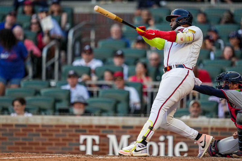 Oct 1, 2023; Cumberland, Georgia, USA; Atlanta Braves designated hitter Marcell Ozuna (20) hits a home run against the Washington Nationals to tie the Major League team record for home runs hit in a season during the ninth inning at Truist Park. Mandatory Credit: Dale Zanine-USA TODAY Sports