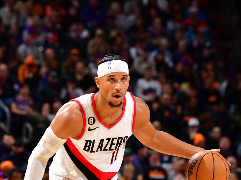 PHOENIX, AZ - NOVEMBER 5: Josh Hart #11 of the Portland Trail Blazers handles the ball during the game against the Phoenix Suns on November 5, 2022 at Footprint Center in Phoenix, Arizona. NOTE TO USER: User expressly acknowledges and agrees that, by downloading and or using this photograph, user is consenting to the terms and conditions of the Getty Images License Agreement. Mandatory Copyright Notice: Copyright 2022 NBAE (Photo by Barry Gossage/NBAE via Getty Images)