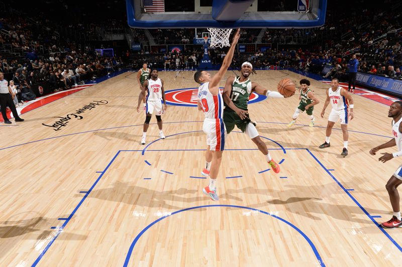 DETROIT, MI - OCTOBER 6: Stanley Umude #17 of the Milwaukee Bucks drives to the basket during the game against the Detroit Pistons during a NBA preseason game on October 6, 2024 at Little Caesars Arena in Detroit, Michigan. NOTE TO USER: User expressly acknowledges and agrees that, by downloading and/or using this photograph, User is consenting to the terms and conditions of the Getty Images License Agreement. Mandatory Copyright Notice: Copyright 2024 NBAE (Photo by Chris Schwegler/NBAE via Getty Images)