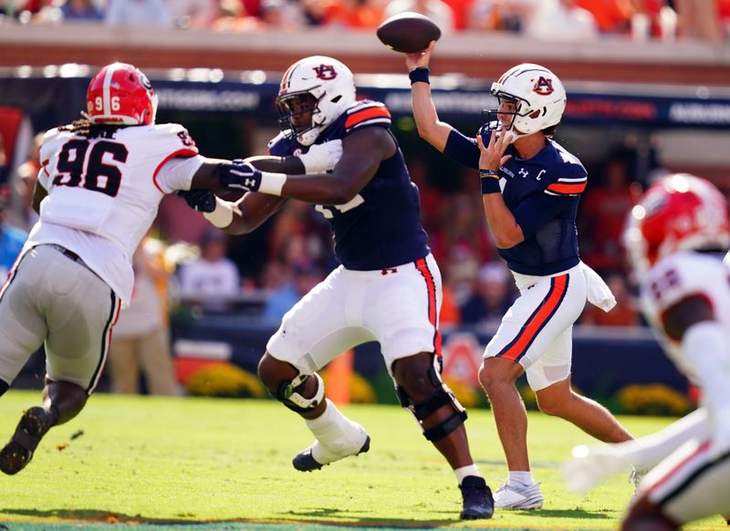 Sep 30, 2023; Auburn, Alabama, USA; Auburn Tigers quarterback Payton Thorne (1) passing against the Georgia Bulldogs during the first quarter at Jordan-Hare Stadium. Mandatory Credit: John David Mercer-USA TODAY Sports