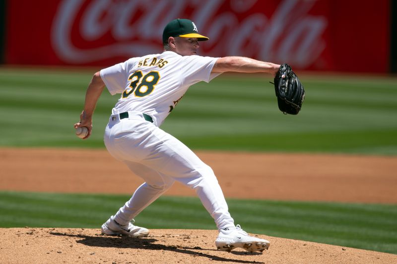 Jun 22, 2024; Oakland, California, USA; Oakland Athletics starting pitcher JP Sears (38) delivers a pitch against the Minnesota Twins during the first inning at Oakland-Alameda County Coliseum. Mandatory Credit: D. Ross Cameron-USA TODAY Sports