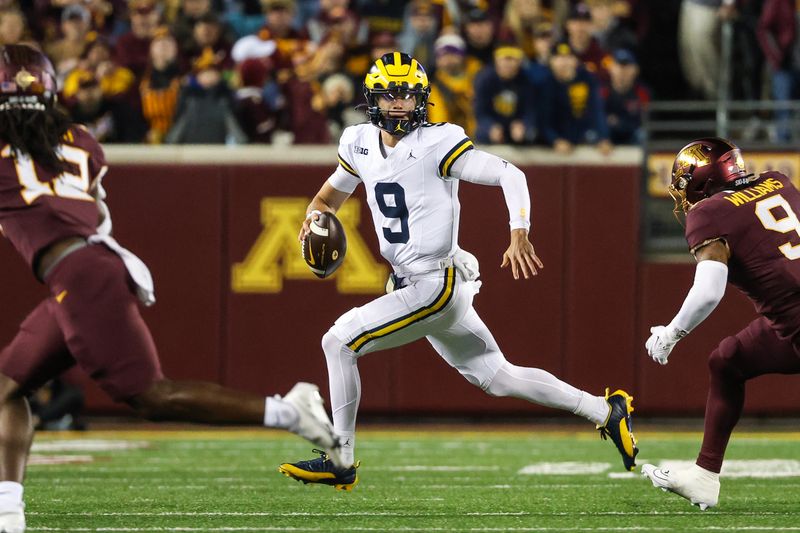 Oct 7, 2023; Minneapolis, Minnesota, USA; Michigan Wolverines quarterback J.J. McCarthy (9) runs the ball against the Minnesota Golden Gophers during the first quarter at Huntington Bank Stadium. Mandatory Credit: Matt Krohn-USA TODAY Sports